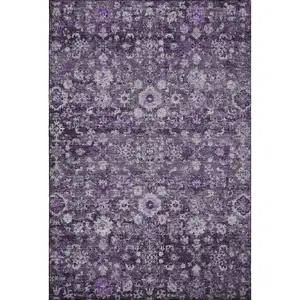 Photo of Purple And Ivory Oriental Washable Area Rug With UV Protection