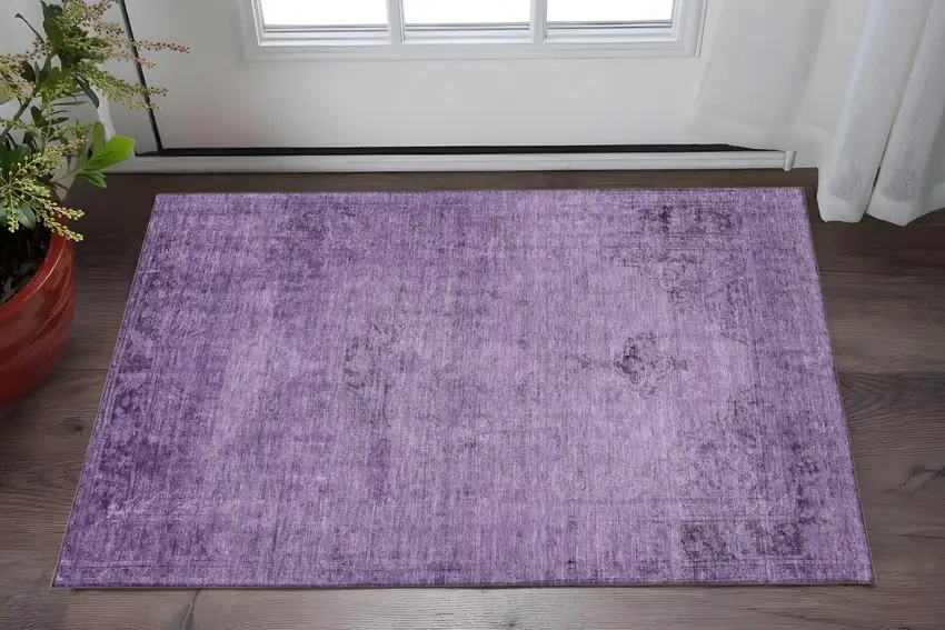 Purple And Ivory Oriental Washable Area Rug With UV Protection Photo 2