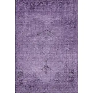 Photo of Purple And Ivory Oriental Washable Area Rug With UV Protection