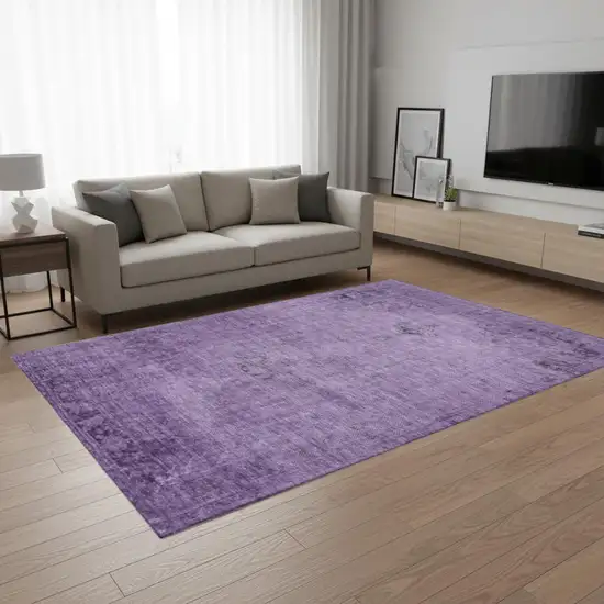 Purple And Ivory Oriental Washable Area Rug With UV Protection Photo 1