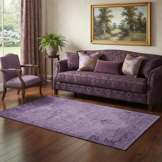Purple And Ivory Oriental Washable Area Rug With UV Protection Photo 1