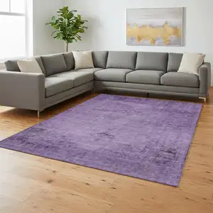 Photo of Purple And Ivory Oriental Washable Area Rug With UV Protection