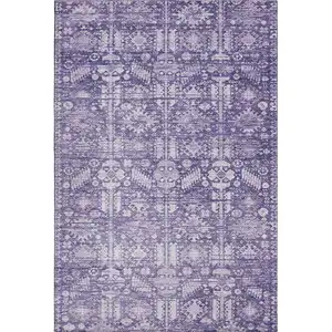 Photo of Purple And Ivory Oriental Washable Area Rug With UV Protection