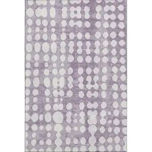 Photo of Purple And Ivory Polka Dot Washable Area Rug With UV Protection