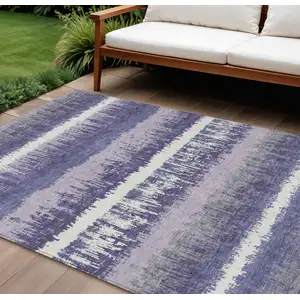 Photo of Purple And Ivory Striped Washable Indoor Outdoor Area Rug