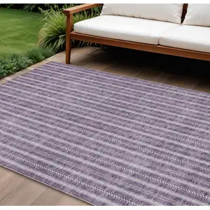 Photo of Purple And Ivory Striped Washable Indoor Outdoor Area Rug