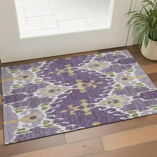 Purple Gold And Ivory Ikat Washable Area Rug With UV Protection Photo 1