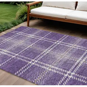 Photo of Purple Gold And Ivory Plaid Washable Indoor Outdoor Area Rug
