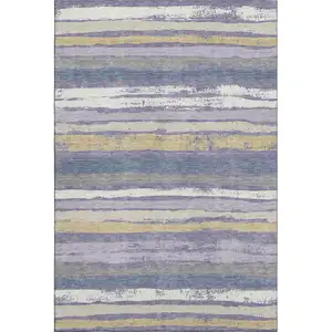 Photo of Purple Gold And Ivory Striped Washable Area Rug With UV Protection