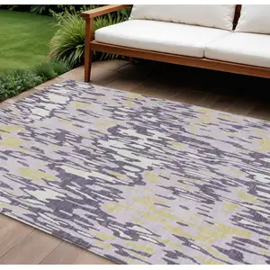 Photo of Purple Gold And Ivory Striped Washable Indoor Outdoor Area Rug