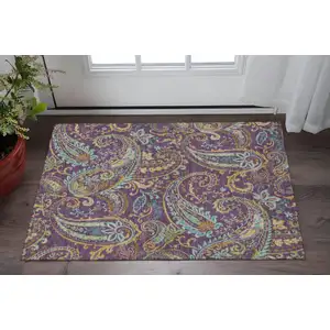 Photo of Purple Green And Blue Paisley Washable Area Rug With UV Protection