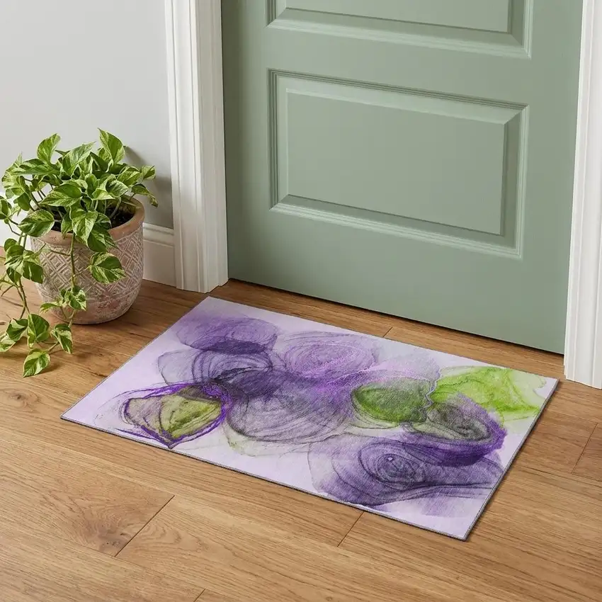 Purple Green And Ivory Abstract Washable Area Rug With UV Protection Photo 1
