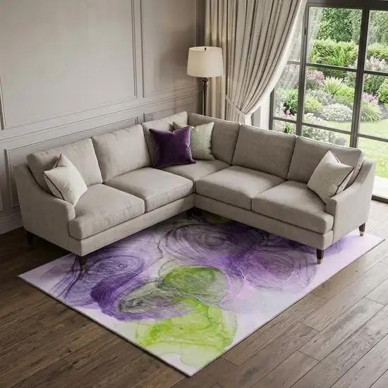Purple Green And Ivory Abstract Washable Area Rug With UV Protection Photo 1