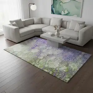 Photo of Purple Green And Ivory Abstract Washable Area Rug With UV Protection