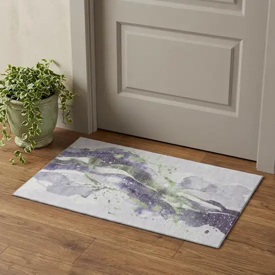 Purple Green And Ivory Abstract Washable Area Rug With UV Protection Photo 1