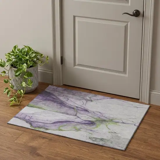 Purple Green And Ivory Abstract Washable Area Rug With UV Protection Photo 1