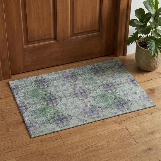 Purple Green And Ivory Floral Medallion Distressed Washable Area Rug With UV Protection Photo 1