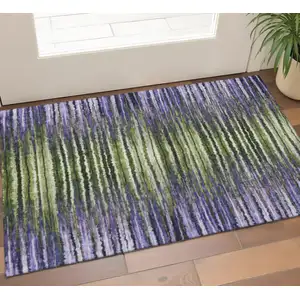 Photo of Purple Green And Ivory Striped Washable Area Rug With UV Protection