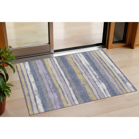 Purple Ivory And Beige Striped Washable Indoor Outdoor Area Rug Photo 1