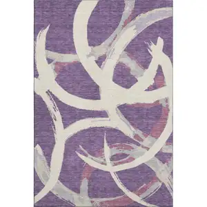 Photo of Purple Ivory And Blush Abstract Washable Area Rug With UV Protection