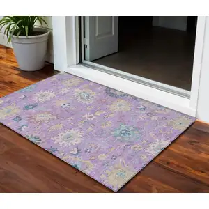 Photo of Purple Ivory And Denim Blue Floral Washable Indoor Outdoor Area Rug