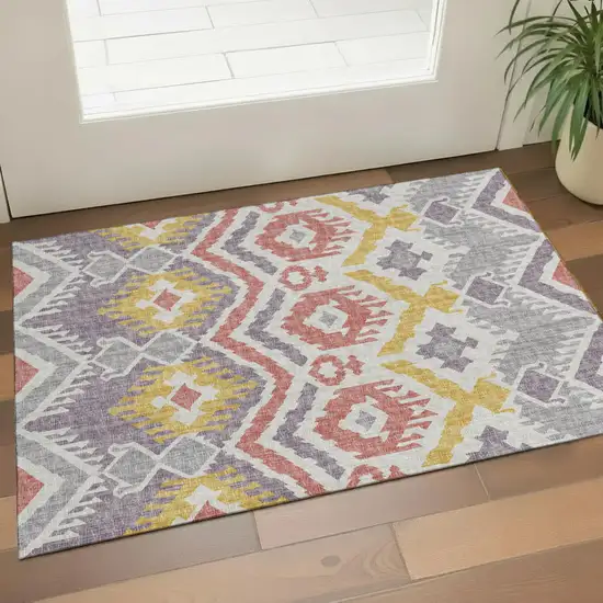 Purple Ivory And Gold Tribal Washable Area Rug With UV Protection Photo 1