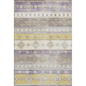 Photo of Purple Ivory And Gold Tribal Washable Area Rug With UV Protection