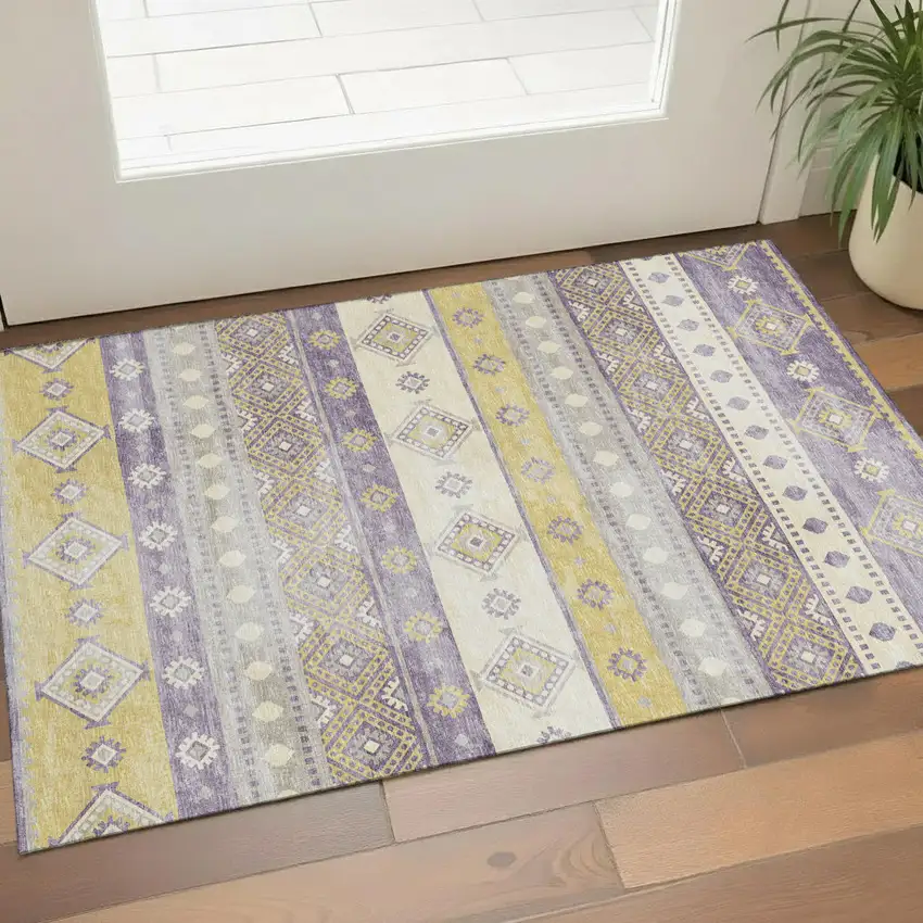 Purple Ivory And Gold Tribal Washable Area Rug With UV Protection Photo 1