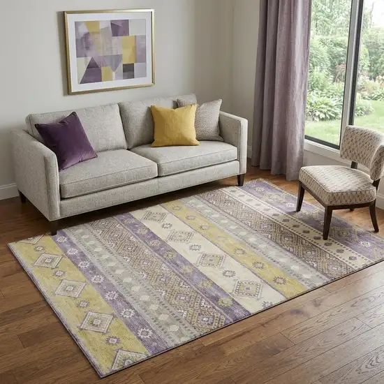 Purple Ivory And Gold Tribal Washable Area Rug With UV Protection Photo 1