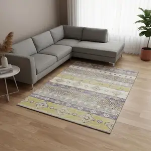 Photo of Purple Ivory And Gold Tribal Washable Area Rug With UV Protection