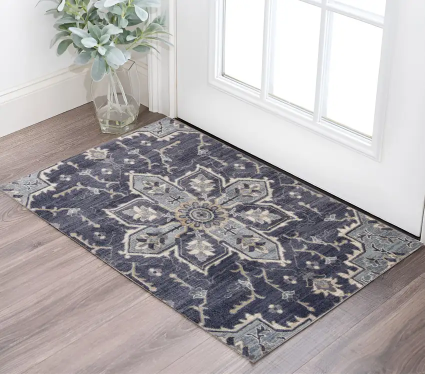 Purple and Ivory Floral Medallion Power Loom Area Rug Photo 1