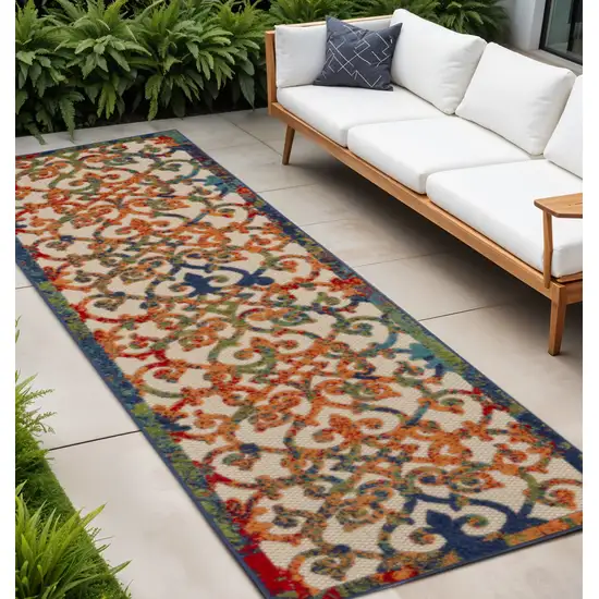 10' Ivory And Blue Indoor Outdoor Area Rug Photo 2