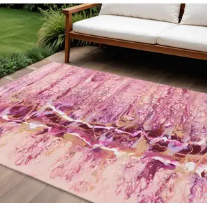 Photo of Raspberry Ivory And Gold Abstract Washable Indoor Outdoor Area Rug