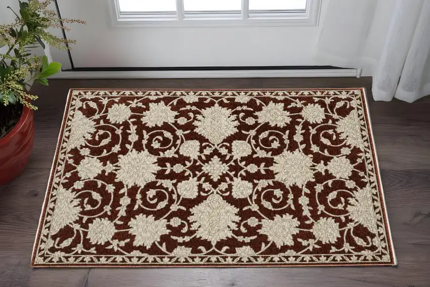 Red And Beige Floral Area Rug With Fringe Photo 1