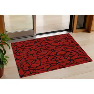 Photo of Red And Black Geometric Washable Indoor Outdoor Area Rug
