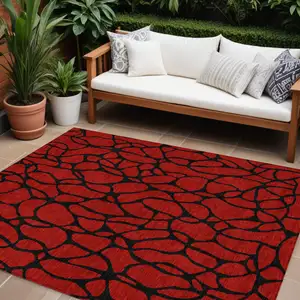 Photo of Red And Black Geometric Washable Indoor Outdoor Area Rug