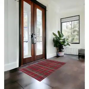 Photo of Red And Black Plaid Area Rug