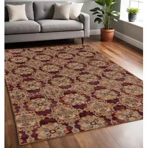 Photo of Red And Gold Oriental Power Loom Stain Resistant Area Rug