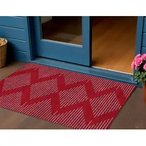 Photo of Red And Gray Geometric Washable Indoor Outdoor Area Rug