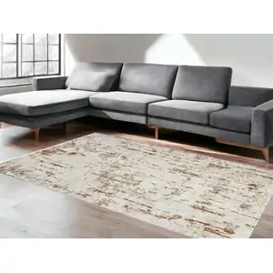 Photo of Red And Ivory Abstract Area Rug