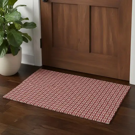 Red And Ivory Abstract Geometric Washable Area Rug With UV Protection Photo 1