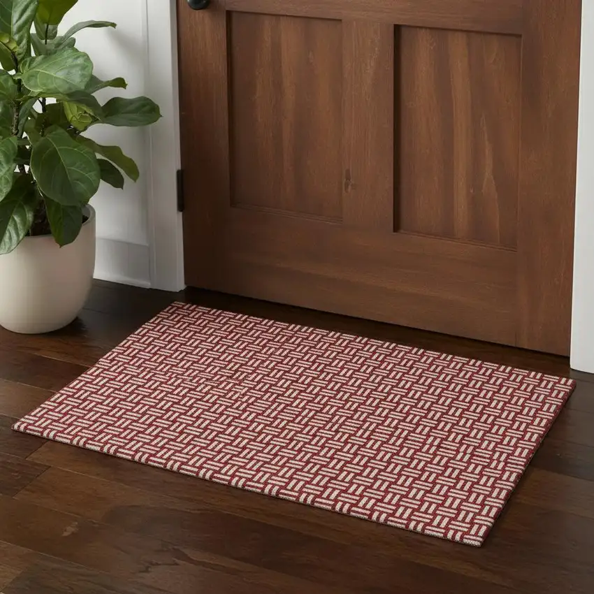 Red And Ivory Abstract Geometric Washable Area Rug With UV Protection Photo 1