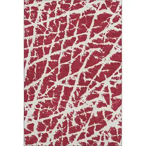 Photo of Red And Ivory Abstract Washable Area Rug With UV Protection
