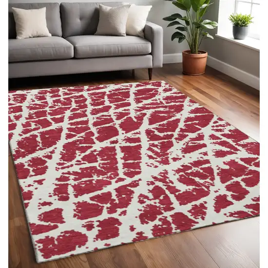 Red And Ivory Abstract Washable Area Rug With UV Protection Photo 2