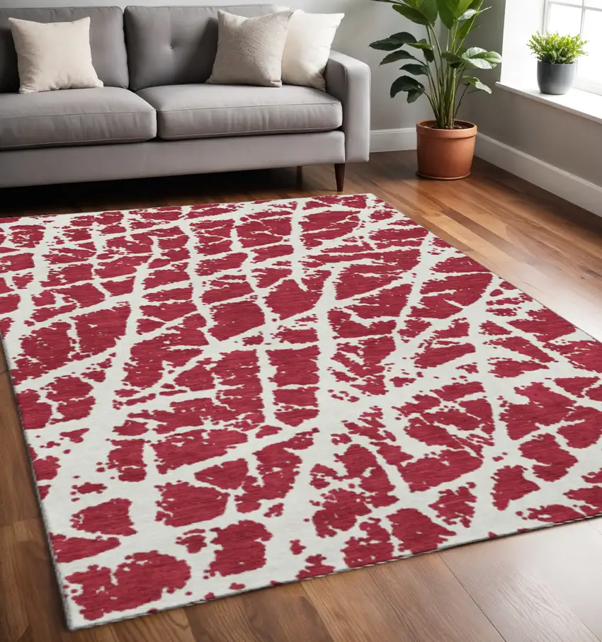 Red And Ivory Abstract Washable Area Rug With UV Protection Photo 2