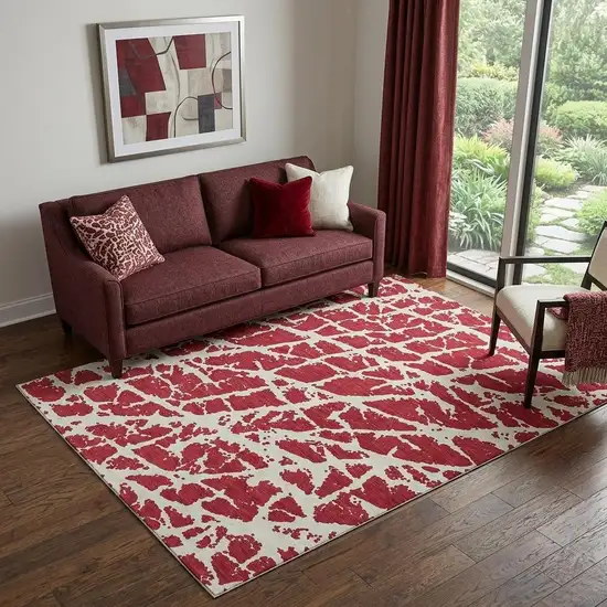 Red And Ivory Abstract Washable Area Rug With UV Protection Photo 1
