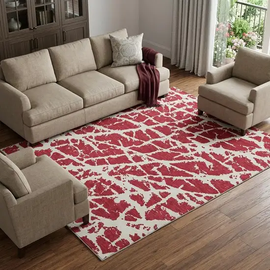 Red And Ivory Abstract Washable Area Rug With UV Protection Photo 1