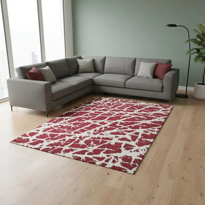 Red And Ivory Abstract Washable Area Rug With UV Protection Photo 1