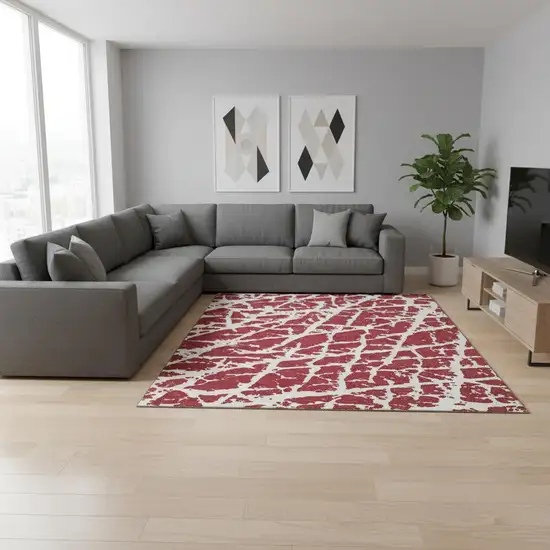 Red And Ivory Abstract Washable Area Rug With UV Protection Photo 1