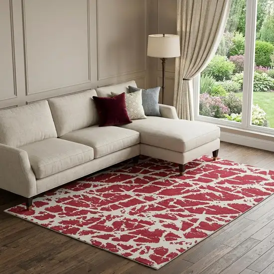 Red And Ivory Abstract Washable Area Rug With UV Protection Photo 1